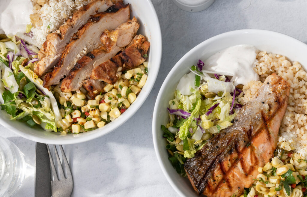 tender greens california bowl with chicken and salmon with corn salsa